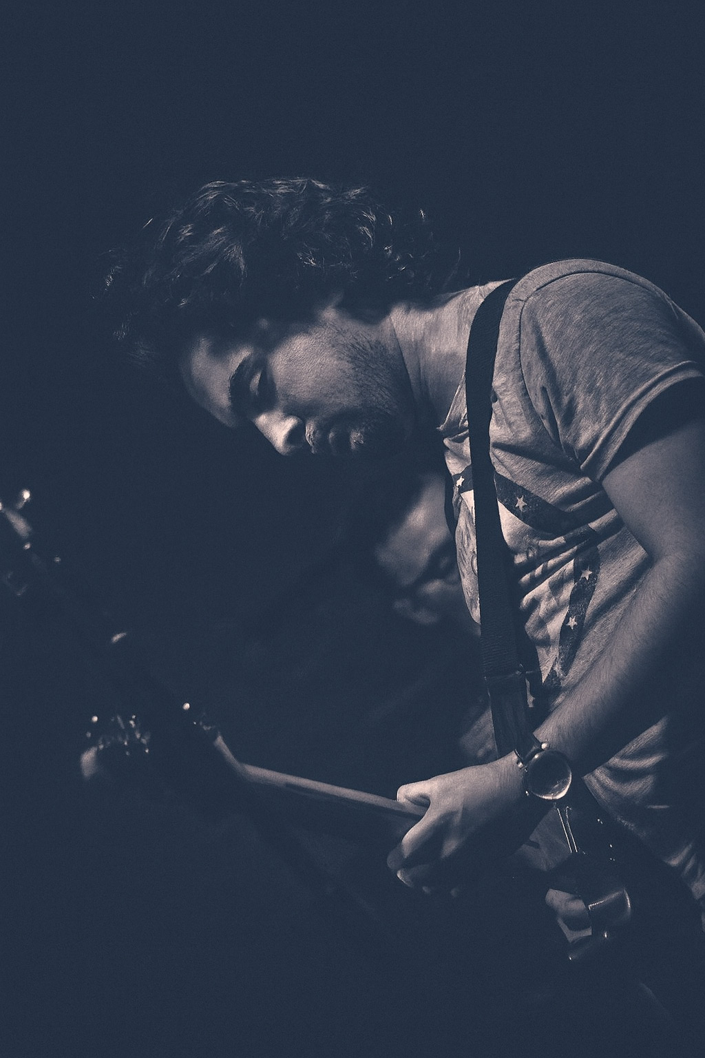 Matthew Irvine performing on guitar